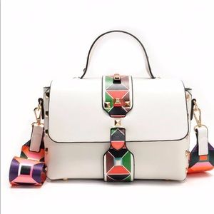 Julia Kay’s FRUSTRUM strap messenger bag